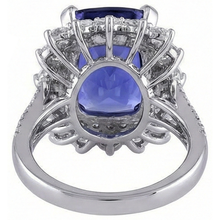 natural round tanzanite 7.75ct ring with diamond accents
