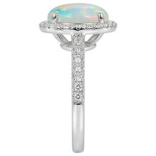 natural round opal 9.40ct ring on white background