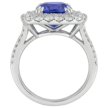natural round tanzanite 9.50ct ring on white background