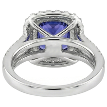 natural round tanzanite 9.50ct ring with diamond accents