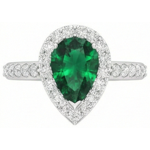 natural round emerald 9.50ct ring top view