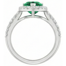 natural round emerald 9.50ct ring on white background
