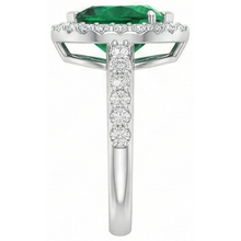natural round emerald 9.50ct ring profile view