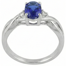natural round tanzanite 1.60ct ring on white background