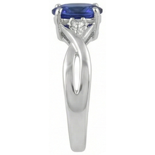 natural round tanzanite 1.60ct ring with diamond accents