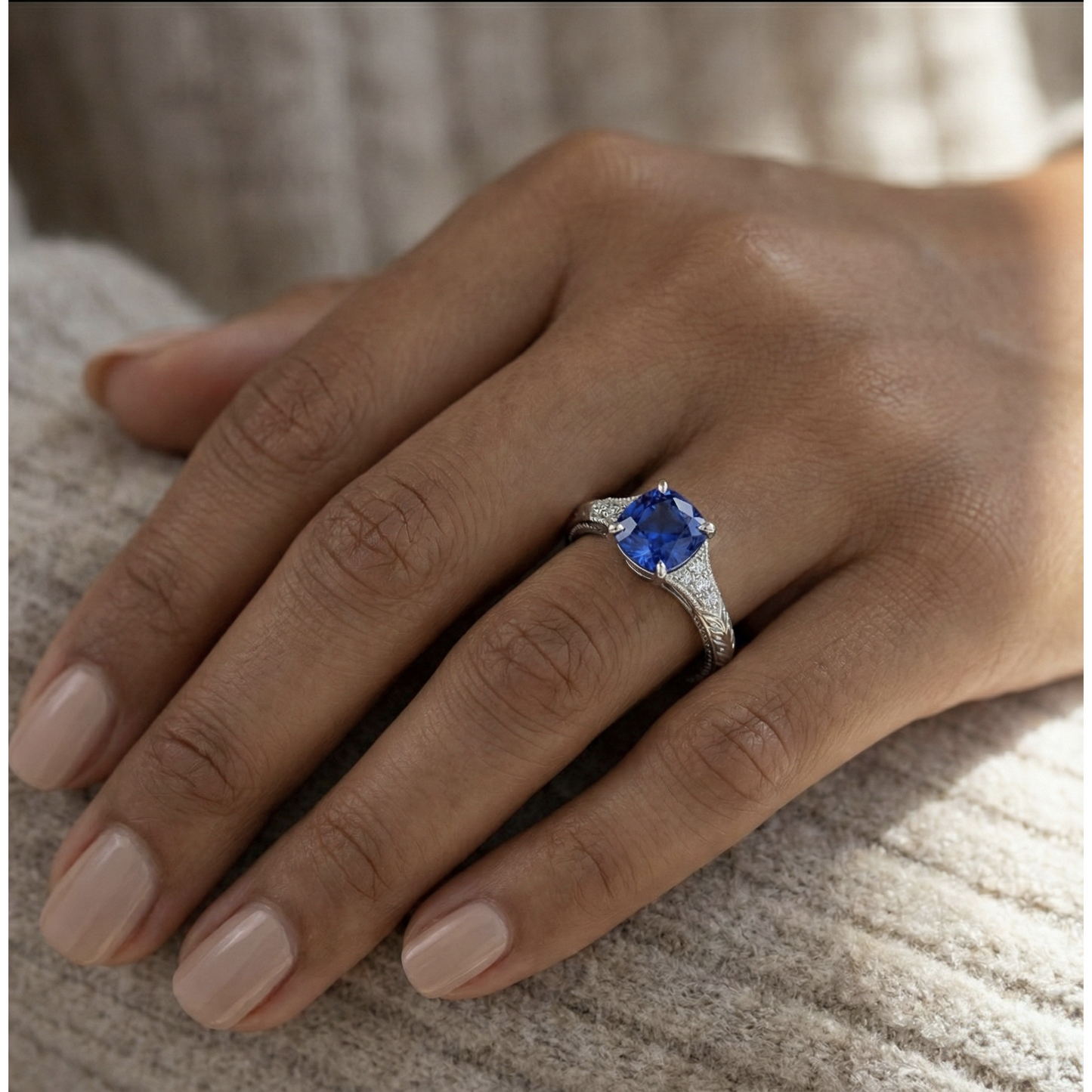natural round sapphire 2ct ring on white background