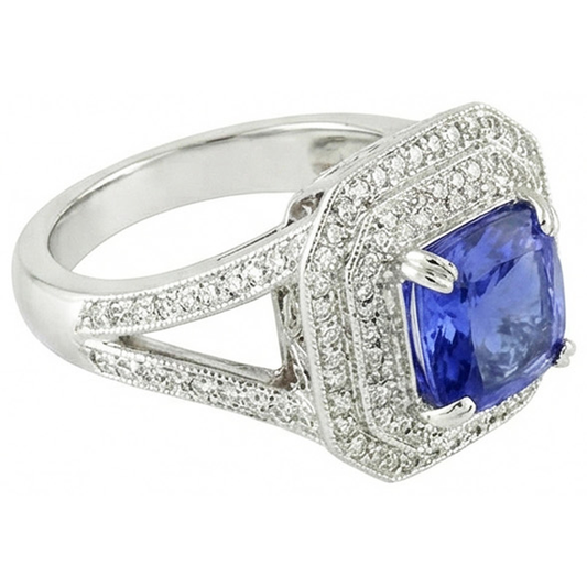 Blue Sapphire With Natural Earth Mined Diamond Halo Ring