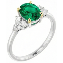 Oval Cut Emerald ring in Two-Tone 14K Gold – angle view