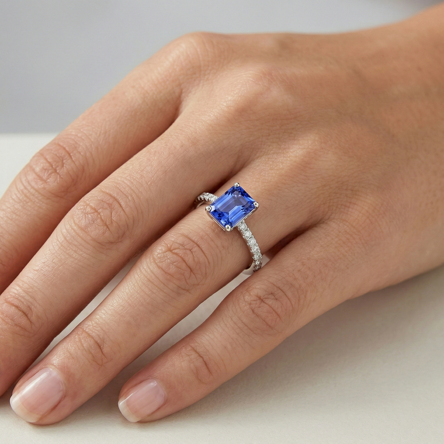 natural round sapphire 3ct ring on white background