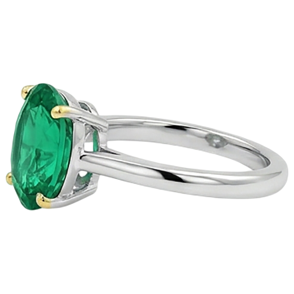 Fine Emerald Oval Cut Colored Stone Ring in Two-Tone 14K Gold – top view