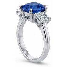 natural cushion sapphire 4ct ring on white background