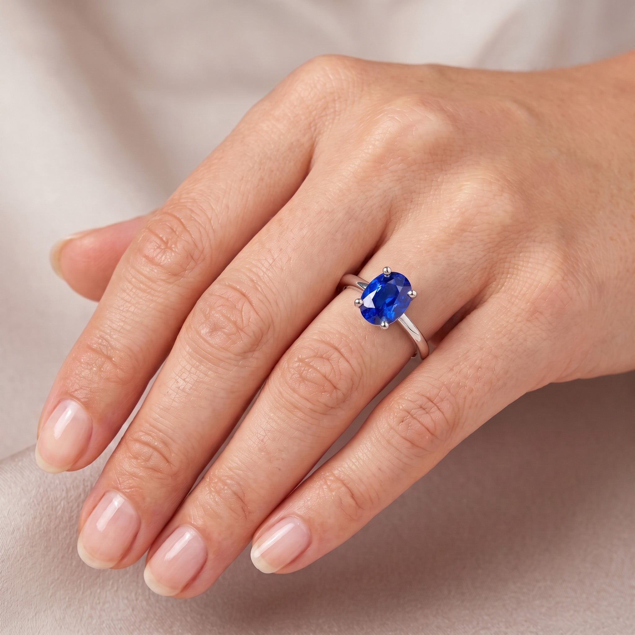 Dark Blue Sapphire Oval Engagement Ring