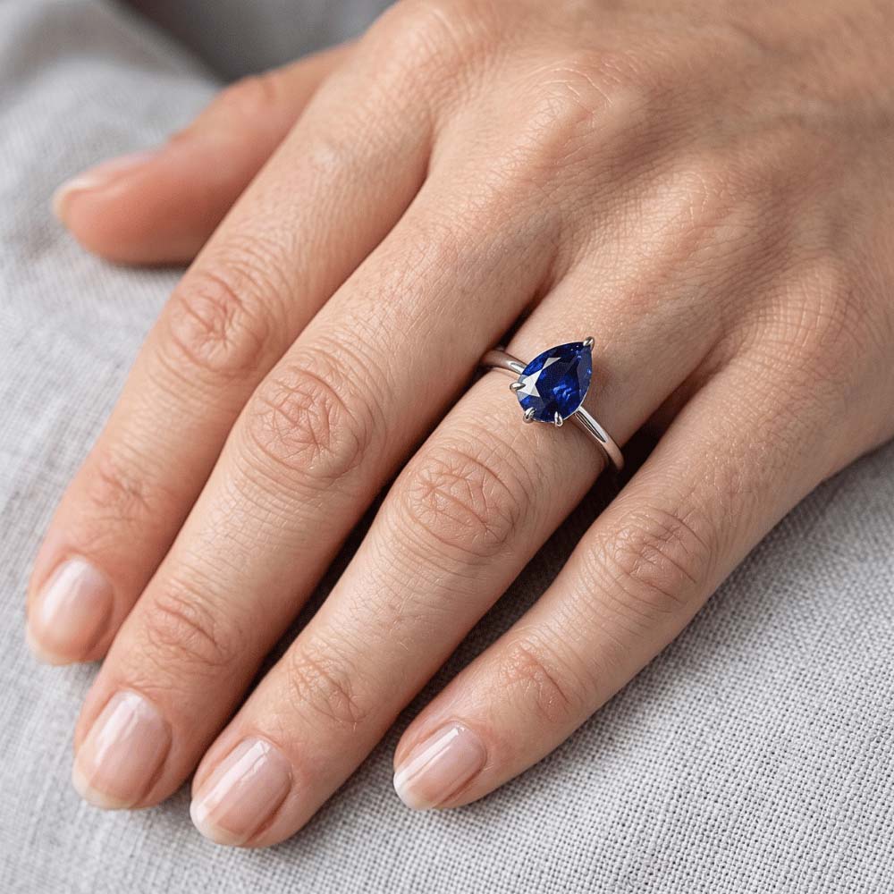 Eagle Claw Prongs Ladies Solitaire Ring Pear Cut Blue Sapphire Jewellery