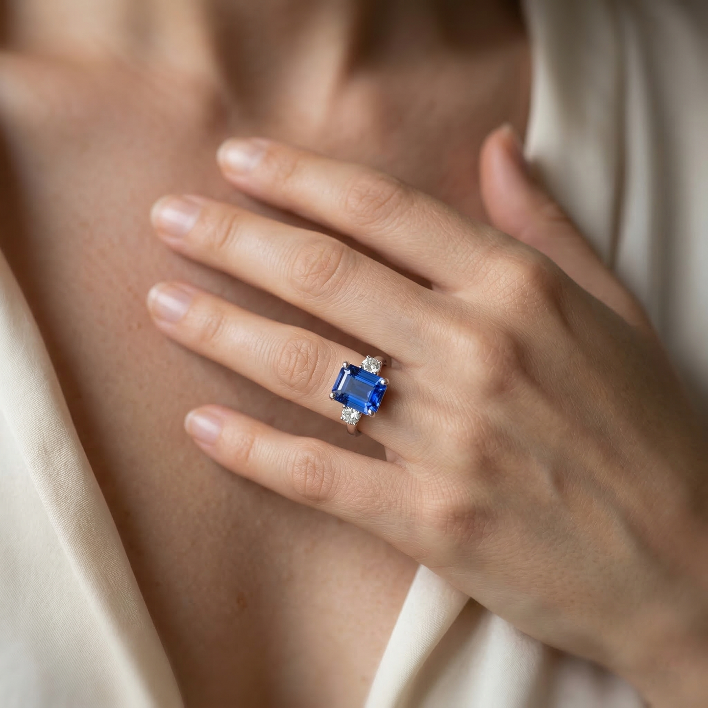natural round sapphire 3ct ring on white background