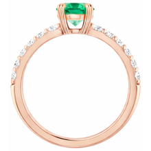 natural round emerald 2.50ct ring on white background
