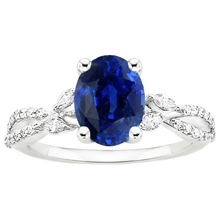 natural round sapphire 4ct ring on white background