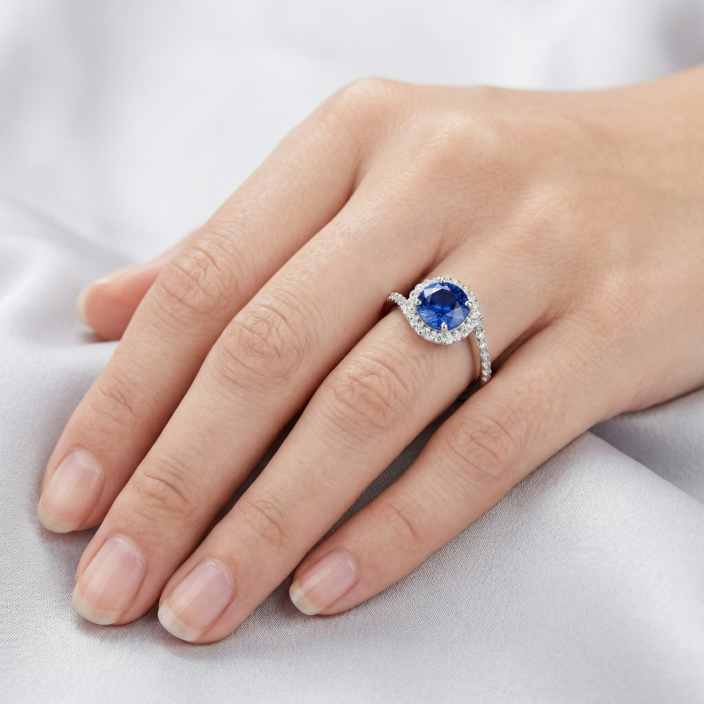 natural round sapphire 2ct ring with diamond accents