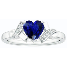 natural round sapphire 2ct ring on white background
