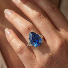 natural pear sapphire 7.25ct ring with diamond accents
