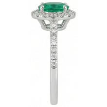natural round emerald 5.25ct ring on white background
