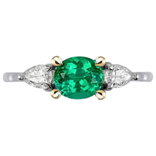 Fine Emerald Oval Cut Gemstone Ring in 14K Two Tone Gold – angle view