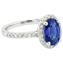 natural round sapphire 3.25ct ring on white background