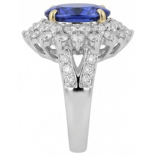 natural round tanzanite 14.00ct ring on white background