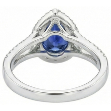 natural round sapphire 4ct ring on white background
