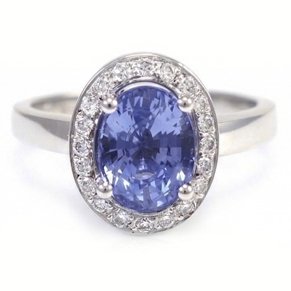 Halo Sapphire And Natural Earth Mined Diamond Ring