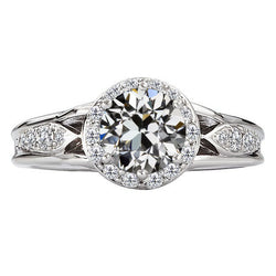 Sophisticated Antique Cushion Brilliant Diamond Halo Setting