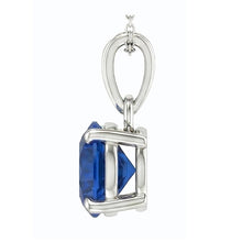 Round Cut Royal Blue Sapphire ring in 14 Karat White Gold – profile view
