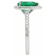 natural round emerald 5.25ct ring profile view