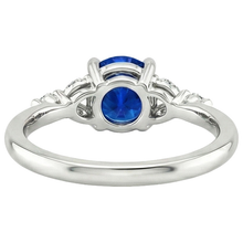 natural round sapphire 3ct ring on white background