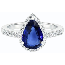 natural round sapphire 4ct ring on white background