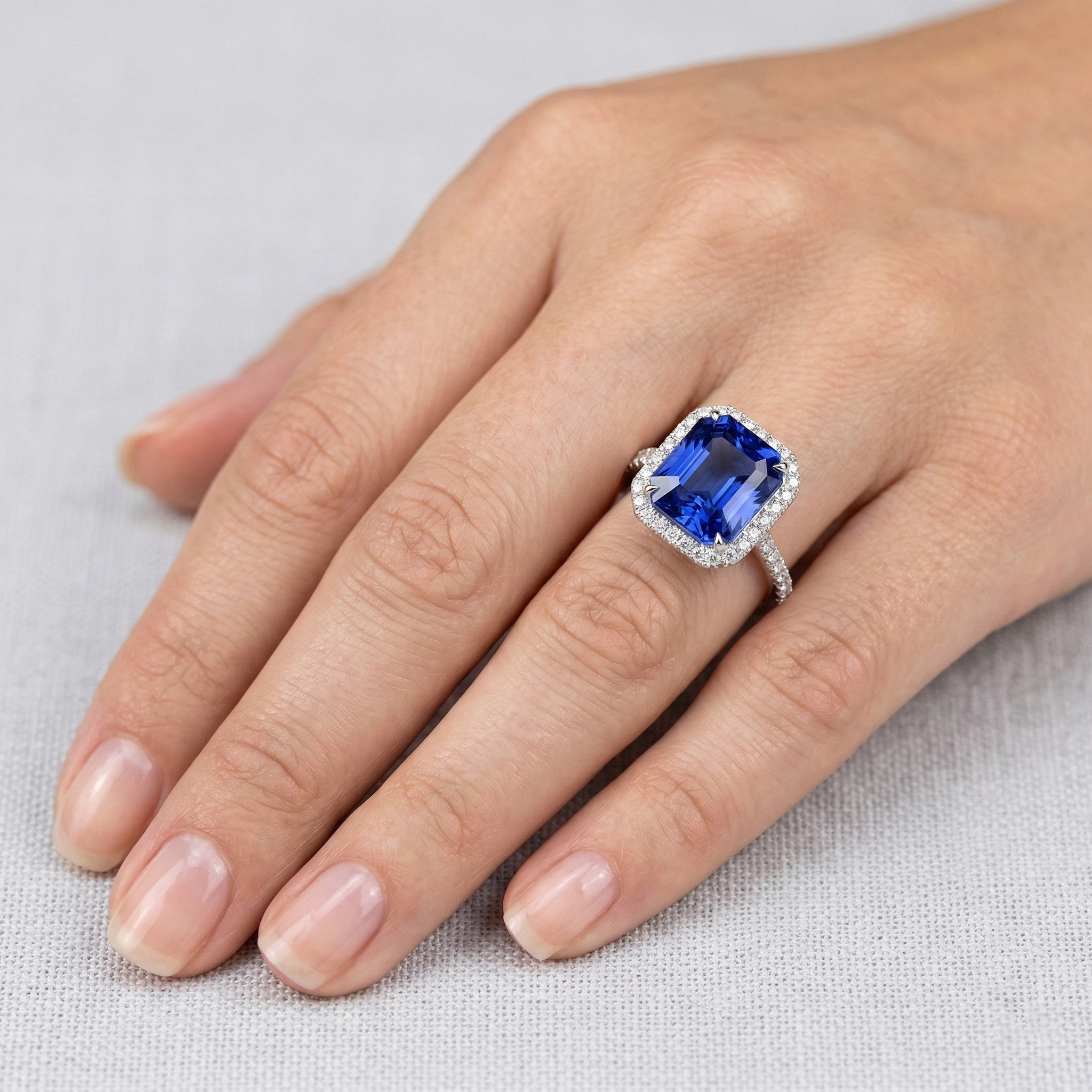 natural round sapphire 5ct ring on white background