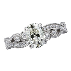 Old Mine Cut Diamond Solitaire with Side Stones in 14 Karat