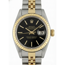 Rolex Gold with Gemstone – front view