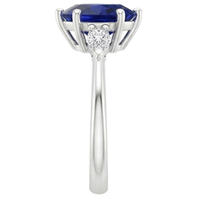 natural pear sapphire 3ct ring on white background