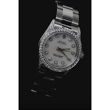 natural round diamond watch close up detail