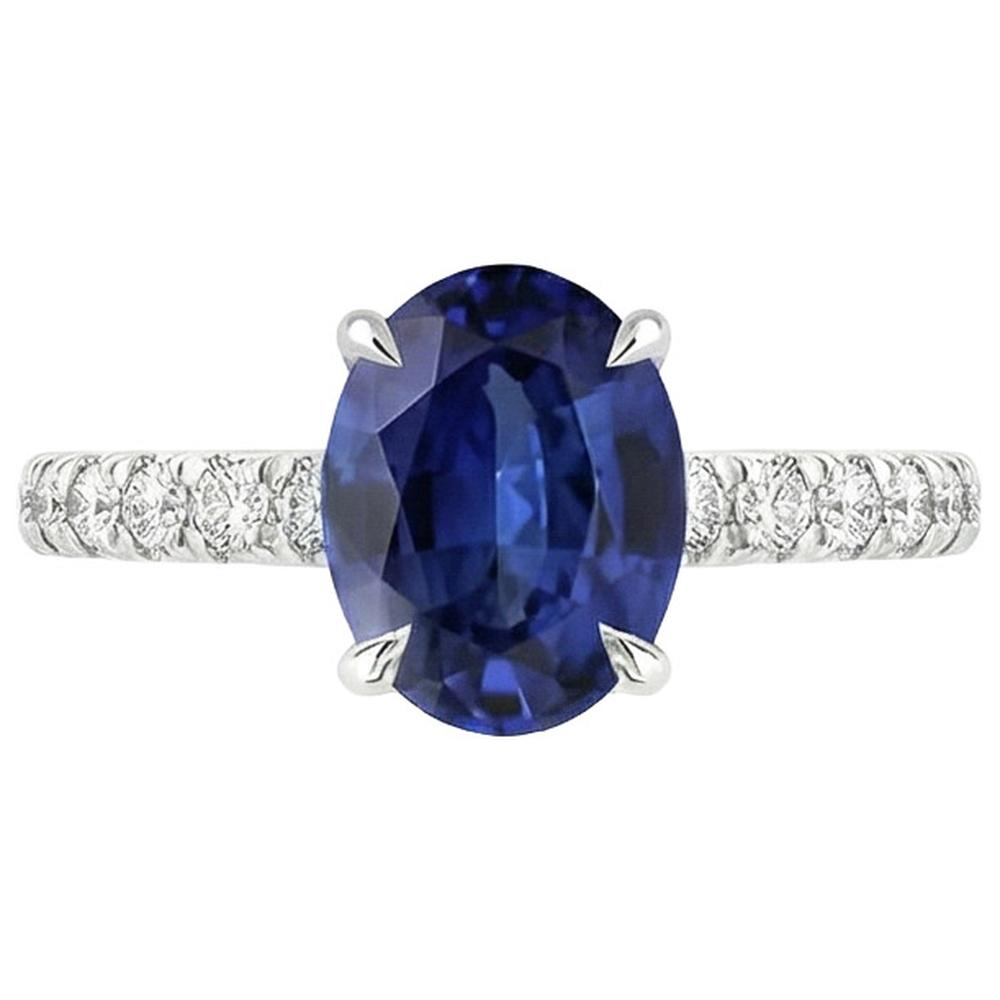 natural round sapphire 4ct ring on white background