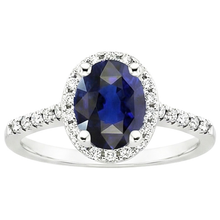natural round sapphire 4ct ring on white background
