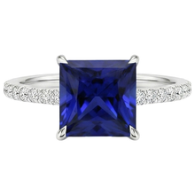 natural round sapphire 5.50ct ring on white background