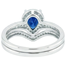 natural round sapphire 4ct ring on white background