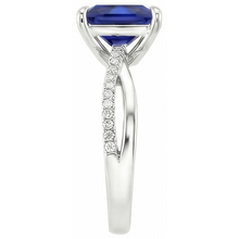 natural round sapphire 5.50ct ring on white background
