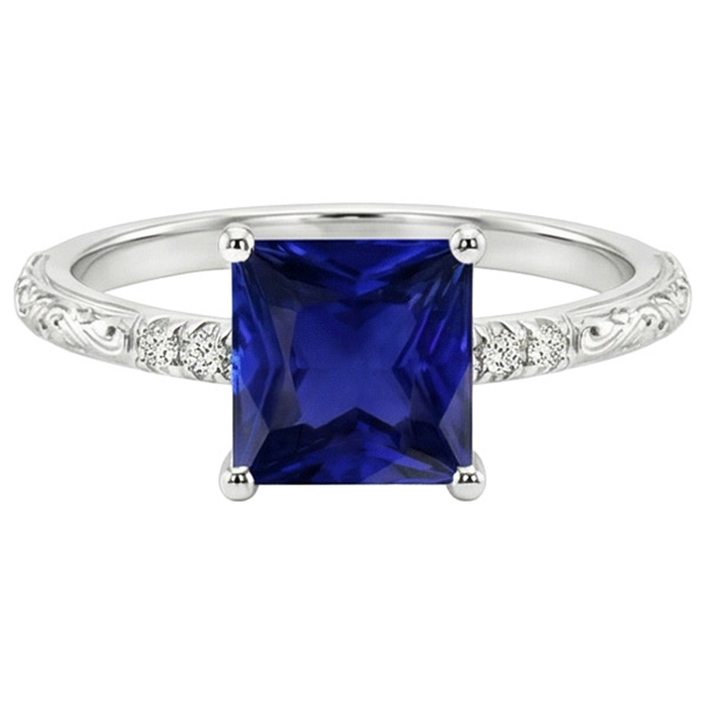 natural round sapphire 5.25ct ring on white background