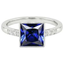 natural round sapphire 5.25ct ring on white background