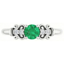 natural round emerald 1.40ct ring side angle