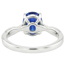 natural round sapphire 6ct ring on white background