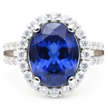 Oval Cabochon Sapphire Ladies Halo Ring