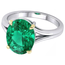 Fine Emerald Oval Cut Colored Stone Ring in 14 Karat Two Tone Gold – angle view